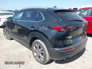 2024 Mazda CX-30 S Premium with VIN 3MVDMBDM4RM651543, listed as a IAAI auction lot 41993345 with 25,675 mi miles and . Bid and sale history available at DreamBid. Image 3.