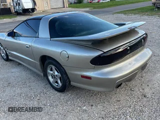 1999 Pontiac Firebird Formula with VIN 2G2FV22G1X2205745, listed as a Copart auction lot 65841425 with 142,913 mi miles and Clean title. Bid and sale history available at DreamBid. Image 3.