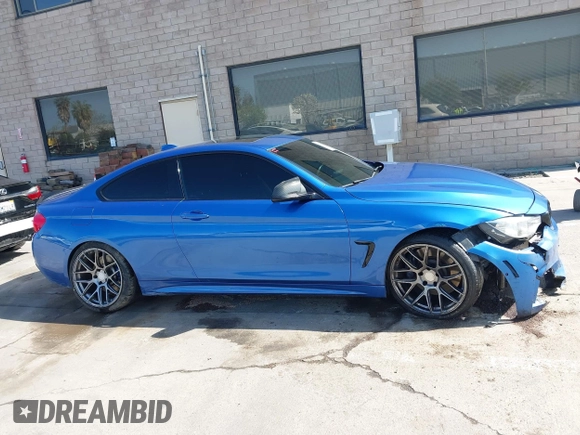 2015 BMW 4 Series 435i with VIN WBA3R1C50FF774588, listed as a IAAI auction lot 42001394 with 96,400 mi miles and . Bid and sale history available at carsss.com. Image 14.