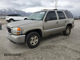 2001 GMC Yukon SLT z VIN 1GKEK13T31R141237, wystawiony jako Copart lot #51156315 z przebiegiem 195 214 mil mil oraz Szkoda całkowita • Salvage title. Historia ofert i sprzedaży dostępna na DreamBid. Obrazek 1.