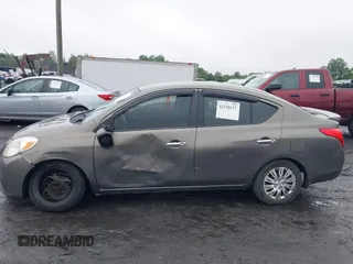 2013 Nissan Versa S with VIN 3N1CN7AP9DL861143, listed as a IAAI auction lot 42538137 with 249,439 mi miles and . Bid and sale history available at DreamBid. Image 14.