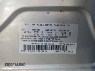 2006 Mazda 3 s with VIN JM1BK324861541353, listed as a Copart auction lot 85734934 with 198,881 mi miles and Salvage Title. Bid and sale history available at DreamBid. Image 12.
