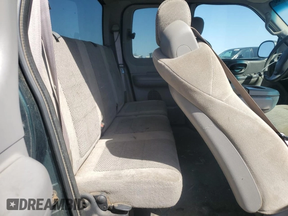 2001 Ford F-150 XL z VIN 1FTRX18W31NB38718, wystawiony jako Copart lot #53833255 z przebiegiem 320 121 mil mil oraz Szkoda całkowita • Salvage title. Historia ofert i sprzedaży dostępna na DreamBid. Obrazek 10.