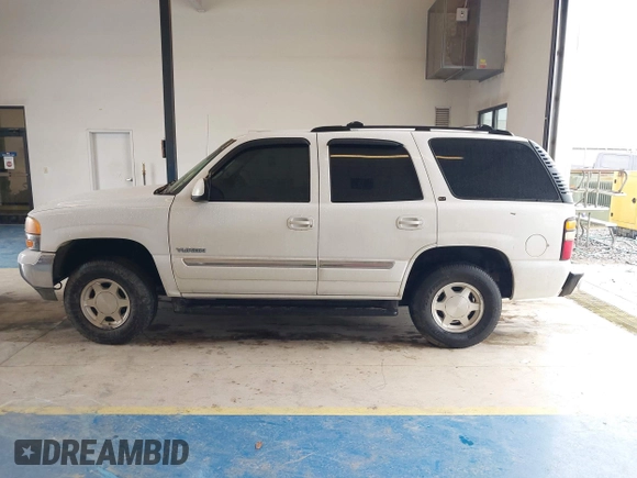 2004 GMC Yukon SLE z VIN 1GKEC13V64R107506, wystawiony jako IAAI lot #41407353 z przebiegiem 215 127 mil mil oraz . Historia ofert i sprzedaży dostępna na DreamBid. Obrazek 14.