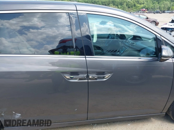 2014 Honda Odyssey Touring with VIN 5FNRL5H99EB138952, listed as a IAAI auction lot 42538833 with 146,959 mi miles and . Bid and sale history available at DreamBid. Image 13.