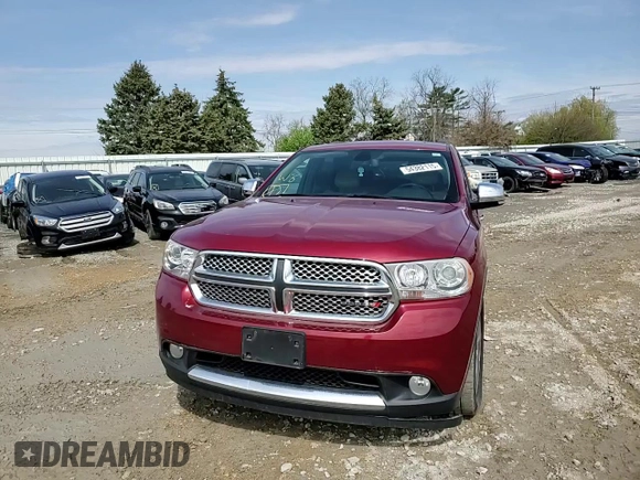 2013 Dodge Durango Citadel z VIN 1C4RDJEG9DC655575, wystawiony jako Copart lot #54382115 z przebiegiem 166 453 mil mil oraz Szkoda całkowita • Salvage title. Historia ofert i sprzedaży dostępna na DreamBid. Obrazek 15.