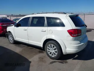 2014 Dodge Journey American Value Pkg with VIN 3C4PDCAB5ET230096, listed as a IAAI auction lot 41846510 with 178,397 mi miles. Bid and sale history available at carsss.com. Image 3.