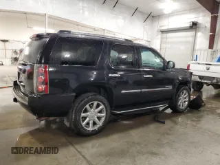 2013 GMC Yukon Denali with VIN 1GKS2EEF0DR283857, listed as a Copart auction lot 46505705 with 148,428 mi miles and Salvage Title. Bid and sale history available at carsss.com. Image 3.