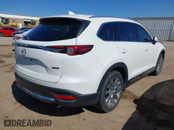 2018 Mazda CX-9 Grand Touring with VIN JM3TCADY6J0229768, listed as a IAAI auction lot 41724072 with 80,918 mi miles and . Bid and sale history available at DreamBid. Image 4.