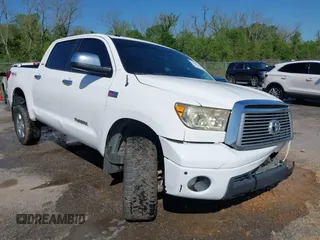 2012 Toyota Tundra 4WD Truck LTD with VIN 5TFHW5F1XCX269682, listed as a IAAI auction lot 41968019 with 166,074 mi miles. Bid and sale history available at carsss.com. Image 1.
