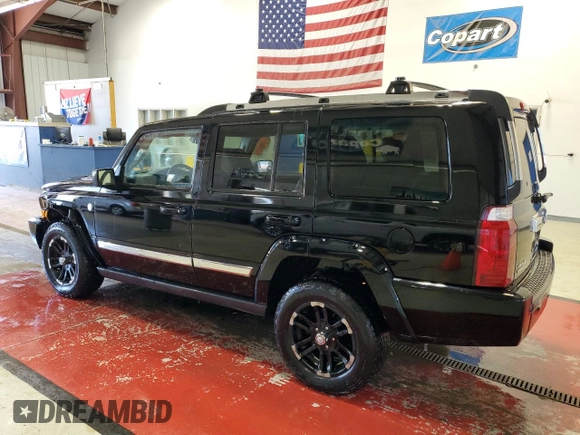 2006 Jeep Commander Limited with VIN 1J8HG58N96C300664, listed as a Copart auction lot 56022715 with 203,172 mi miles and Salvage title. Bid and sale history available at DreamBid. Image 2.