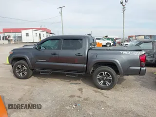 2018 Toyota Tacoma SR with VIN 3TMCZ5AN0JM150540, listed as a IAAI auction lot 41683174 with 78,553 mi miles and . Bid and sale history available at DreamBid. Image 14.