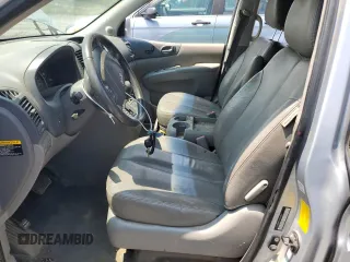 2009 Kia Sedona LX with VIN KNDMB233096296810, listed as a Copart auction lot 64614694 with 231,572 mi miles and Salvage Title. Bid and sale history available at carsss.com. Image 7.