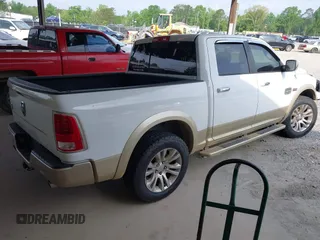 2014 Ram 1500 Longhorn z VIN 1C6RR6PT0ES129729, wystawiony jako IAAI lot #42018089 z przebiegiem 126 074 mil mil oraz . Historia ofert i sprzedaży dostępna na DreamBid. Obrazek 4.