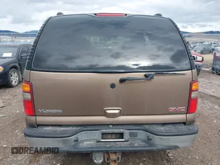 2003 GMC Yukon SLT z VIN 1GKEK13Z93R211332, wystawiony jako IAAI lot #41739150 z przebiegiem Nie podano mil oraz . Historia ofert i sprzedaży dostępna na DreamBid. Obrazek 16.