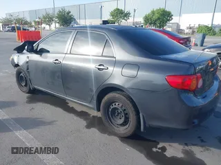 2009 Toyota Corolla with VIN 1NXBU40E29Z143324, listed as a IAAI auction lot 42101208 with 237,763 mi miles. Bid and sale history available at carsss.com. Image 3.