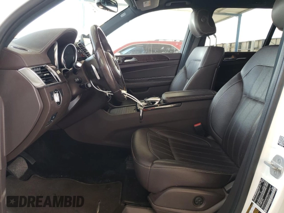 2017 Mercedes-Benz GLS 450 with VIN 4JGDF6EEXHA868385, listed as a Copart auction lot 63715634 with 64,788 mi miles and Salvage Title. Bid and sale history available at DreamBid. Image 7.