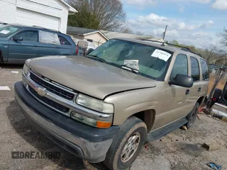 2006 Chevrolet Tahoe LS with VIN 1GNEC13V96J138205, listed as a IAAI auction lot 41746874 with 303,126 mi miles. Bid and sale history available at carsss.com. Image 2.