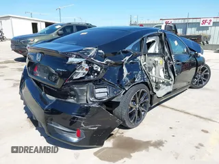 2019 Honda Civic Sport with VIN 19XFC2F89KE051016, listed as a IAAI auction lot 42042322 with 36,775 mi miles and . Bid and sale history available at DreamBid. Image 4.