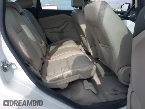 2016 Ford C-Max Energi SEL with VIN 1FADP5CUXGL102011, listed as a IAAI auction lot 41935337 with 95,279 mi miles. Bid and sale history available at carsss.com. Image 8.