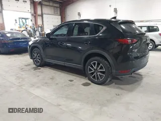 2017 Mazda CX-5 Grand Touring with VIN JM3KFBDL6H0143013, listed as a IAAI auction lot 41912979 with 122,890 mi miles. Bid and sale history available at carsss.com. Image 3.