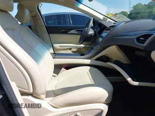 2014 Lincoln MKZ Hybrid with VIN 3LN6L2LU4ER811119, listed as a IAAI auction lot 42190415 with 98,898 mi miles and . Bid and sale history available at DreamBid. Image 5.