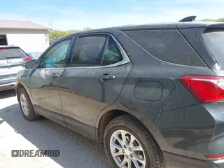 2018 Chevrolet Equinox LT z VIN 2GNAXSEV5J6207807, wystawiony jako IAAI lot #42224888 z przebiegiem 77 435 mil mil oraz . Historia ofert i sprzedaży dostępna na DreamBid. Obrazek 14.