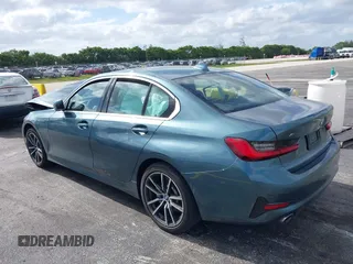 2020 BMW 3 Series 330i xDrive with VIN 3MW5R7J03L8B09157, listed as a IAAI auction lot 39168393 with 69,052 mi miles. Bid and sale history available at carsss.com. Image 3.