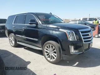 2017 Cadillac Escalade Luxury z VIN 1GYS3BKJ4HR143021, wystawiony jako IAAI lot #41845032 z przebiegiem 156 979 mil mil oraz . Historia ofert i sprzedaży dostępna na DreamBid. Obrazek 1.