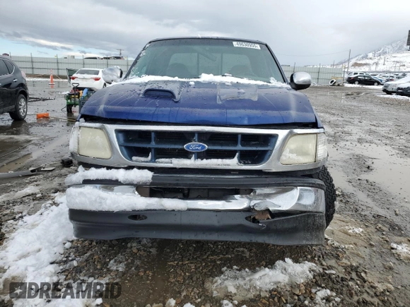 1997 Ford F-150 XL with VIN 1FTEX17LXVKB44786, listed as a Copart auction lot 49630955 with 301,736 mi miles and Salvage title. Bid and sale history available at DreamBid. Image 5.
