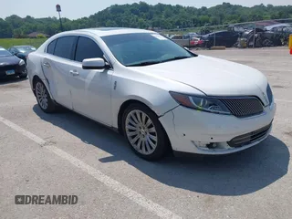 2013 Lincoln MKS with VIN 1LNHL9DK2DG606838, listed as a IAAI auction lot 42454441 with 163,475 mi miles and . Bid and sale history available at DreamBid. Image 1.