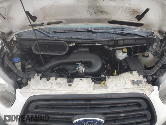2019 Ford Transit with VIN 1FTYR3XM0KKA68129, listed as a Copart auction lot 89016935 with 82,082 mi miles and Salvage title. Bid and sale history available at DreamBid. Image 12.