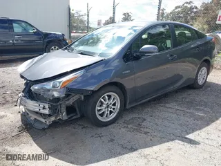 2020 Toyota Prius L Eco with VIN JTDKARFU8L3114786, listed as a IAAI auction lot 41804909 with 196,099 mi miles. Bid and sale history available at carsss.com. Image 18.