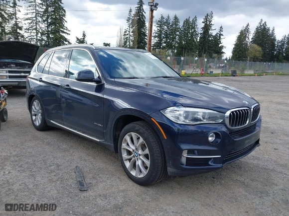 2015 BMW X5 xDrive35d with VIN 5UXKS4C55F0J98874, listed as a IAAI auction lot 42030583 with 151,079 mi miles. Bid and sale history available at carsss.com. Image 1.