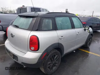 2015 MINI Countryman with VIN WMWZB3C52FWR45805, listed as a IAAI auction lot 41784638 with 41,204 mi miles and . Bid and sale history available at DreamBid. Image 4.
