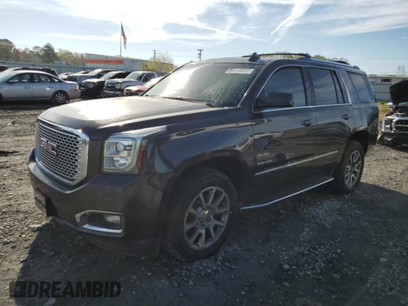 2015 GMC Yukon Denali with VIN 1GKS2CKJ9FR727818, listed as a Copart auction lot 50410655 with 0 mi miles and Salvage Title. Bid and sale history available at carsss.com. Image 1.