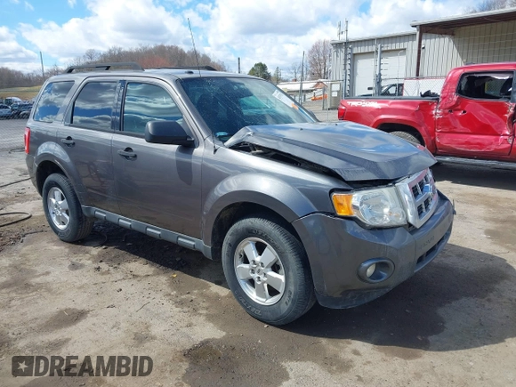 2012 Ford Escape XLT with VIN 1FMCU0D76CKC01916, listed as a IAAI auction lot 41879331 with 194,201 mi miles. Bid and sale history available at carsss.com. Image 1.