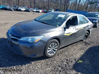 2016 Toyota Camry XLE with VIN 4T4BF1FK0GR572812, listed as a IAAI auction lot 41881376 with 296,352 mi miles. Bid and sale history available at carsss.com. Image 18.