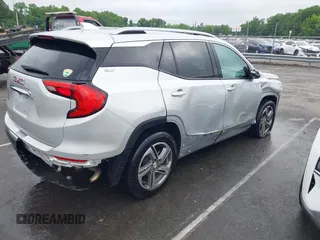 2020 GMC Terrain SLT z VIN 3GKALPEV6LL136556, wystawiony jako IAAI lot #42228618 z przebiegiem 85 070 mil mil oraz . Historia ofert i sprzedaży dostępna na DreamBid. Obrazek 4.