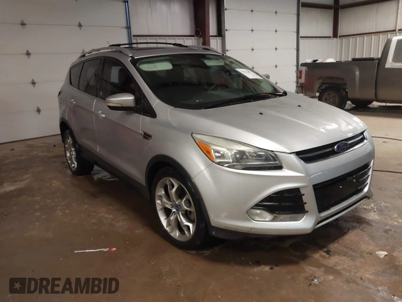 2013 Ford Escape Titanium z VIN 1FMCU0J94DUA93128, wystawiony jako IAAI lot #41612072 z przebiegiem 174 274 mil mil oraz . Historia ofert i sprzedaży dostępna na DreamBid. Obrazek 1.
