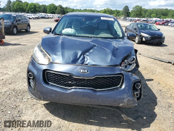 2017 Kia Sportage LX z VIN KNDPMCAC9H7195919, wystawiony jako Copart lot #55166435 z przebiegiem 116 678 mil mil oraz Czysty tytuł • Clean title. Historia ofert i sprzedaży dostępna na DreamBid. Obrazek 5.