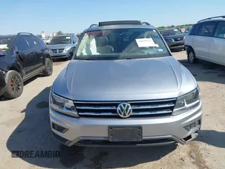 2021 Volkswagen Tiguan SE with VIN 3VV3B7AX0MM026064, listed as a IAAI auction lot 42038137 with 18,526 mi miles and . Bid and sale history available at DreamBid. Image 12.