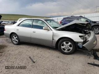 1999 Lexus ES 300 z VIN JT8BF28G3X5063996, wystawiony jako Copart lot #54093095 z przebiegiem 216 576 mil mil oraz Szkoda całkowita • Salvage title. Historia ofert i sprzedaży dostępna na DreamBid. Obrazek 4.