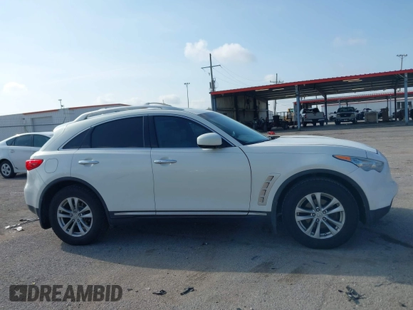 2010 Infiniti FX z VIN JN8AS1MUXAM800384, wystawiony jako IAAI lot #42458960 z przebiegiem 142 976 mil mil oraz . Historia ofert i sprzedaży dostępna na DreamBid. Obrazek 13.