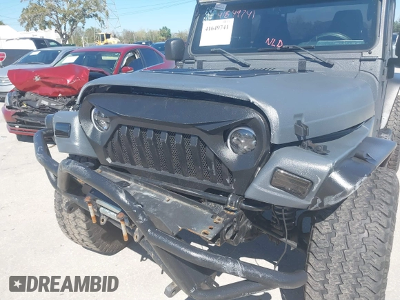 2003 Jeep Wrangler X with VIN 1J4FA39S03P314685, listed as a IAAI auction lot 41649741 with 119,924 mi miles. Bid and sale history available at carsss.com. Image 19.