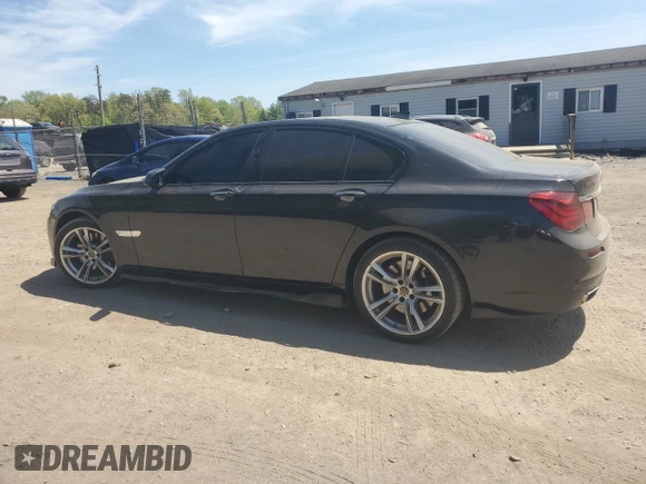 2014 BMW 7 Series 750i xDrive with VIN WBAYB6C52ED224536, listed as a Copart auction lot 54397595 with 107,410 mi miles and Salvage title. Bid and sale history available at DreamBid. Image 2.