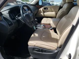 2018 Nissan Armada Platinum with VIN JN8AY2NE8J9732438, listed as a Copart auction lot 56233785 with 122,870 mi miles and Salvage title. Bid and sale history available at DreamBid. Image 7.