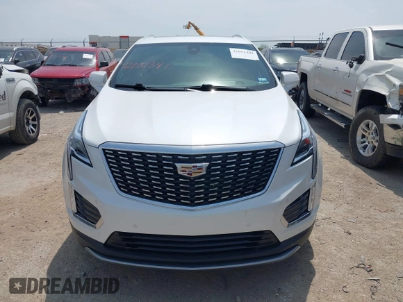 2021 Cadillac XT5 FWD Premium Luxury z VIN 1GYKNCR42MZ174309, wystawiony jako IAAI lot #42051341 z przebiegiem 75 544 mil mil oraz . Historia ofert i sprzedaży dostępna na DreamBid. Obrazek 12.