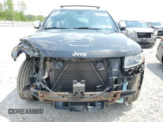 2014 Jeep Grand Cherokee Limited с VIN 1C4RJFBG3EC440429, выставлен на аукционе Copart как лот 63549245 с пробегом 162 178 миль миль и Списание • Salvage title. История ставок и продаж доступна на DreamBid. Изображение 5.
