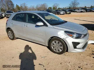2023 Kia Rio 5-Door S with VIN 3KPA25AD5PE512917, listed as a Copart auction lot 42989885 with 69,778 mi miles and Salvage Title. Bid and sale history available at carsss.com. Image 4.